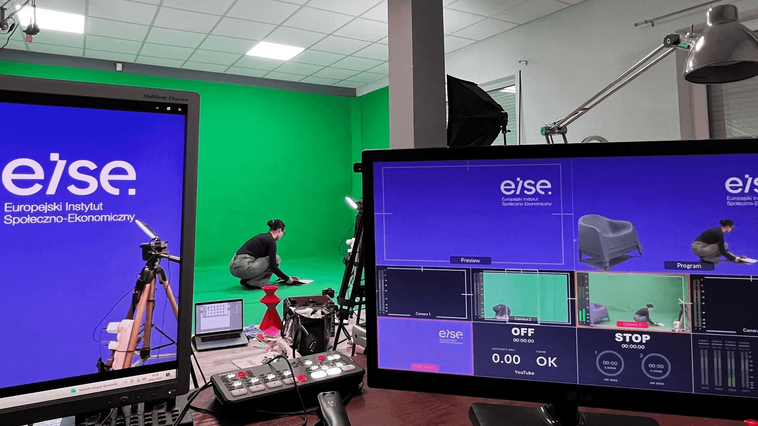Man and woman drawing charts on a whiteboard